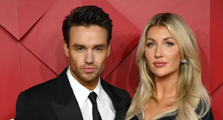 Katie Cassidy, pictured with Payne in December 2022, is opening up about her last conversation with her late boyfriend