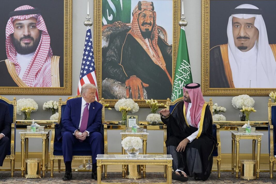 Trump talks with the Saudi crown prince during the ceremony